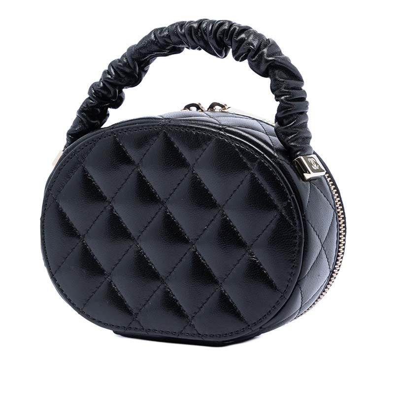 CC Quilted Lambskin Oval Top Handle Clutch