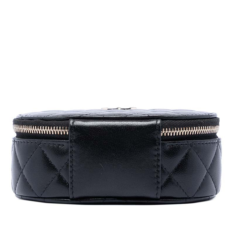 CC Quilted Lambskin Oval Top Handle Clutch