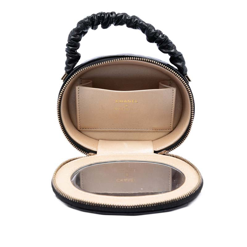 CC Quilted Lambskin Oval Top Handle Clutch