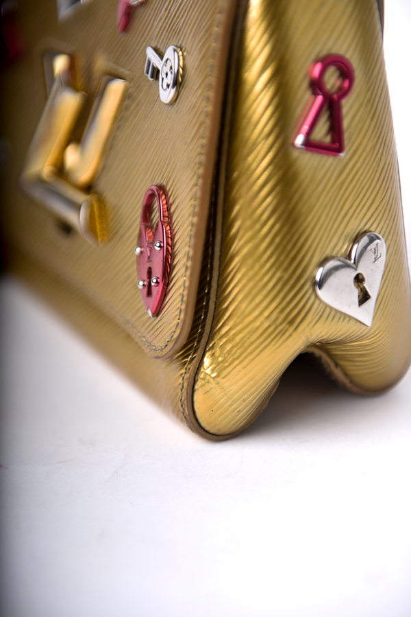 Epi Leather Love Lock Twist Shoulder Bag